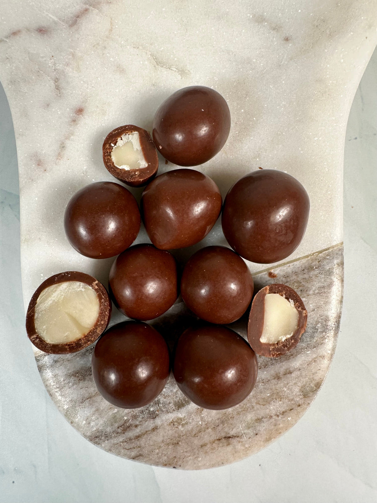 Delicious Oat Milk Chocolate Covered Macadamia Nuts
